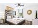 Elegant Primary bedroom with a plush bed and modern decor at 2965 Protagonist St, Kissimmee, FL 34746