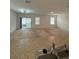Spacious living room with sliding glass doors leading to a patio at 5716 Lakeside Landings Blvd, Winter Haven, FL 33881