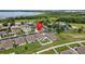 Aerial view of a house in a quiet residential neighborhood at 5716 Lakeside Landings Blvd, Winter Haven, FL 33881