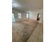 Spacious living room with neutral carpet and sliding glass doors at 5716 Lakeside Landings Blvd, Winter Haven, FL 33881