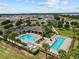 Two sparkling community pools with ample seating at 5716 Lakeside Landings Blvd, Winter Haven, FL 33881