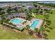 Community pool with lap pool and recreational pool at 5716 Lakeside Landings Blvd, Winter Haven, FL 33881