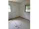 Simple bedroom with drywall and flooring needing work at 207 Robin Rd, Altamonte Springs, FL 32701