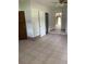 Tiled living area with access to other rooms at 207 Robin Rd, Altamonte Springs, FL 32701