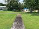 Wooden dock leading to a waterfront property at 207 Robin Rd, Altamonte Springs, FL 32701
