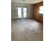 Spacious living room with French doors and hardwood floors at 207 Robin Rd, Altamonte Springs, FL 32701