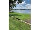 Lakefront property with grassy area at 207 Robin Rd, Altamonte Springs, FL 32701