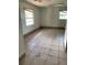 Empty bedroom with tiled floor and window at 207 Robin Rd, Altamonte Springs, FL 32701