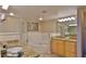 Elegant bathroom with double sinks, soaking tub, and shower at 5300 S Atlantic Ave # 16-602, New Smyrna Beach, FL 32169