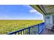 Relaxing balcony with seating and tranquil nature views at 5300 S Atlantic Ave # 16-602, New Smyrna Beach, FL 32169