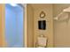 Small bathroom with shower and toilet at 5300 S Atlantic Ave # 16-602, New Smyrna Beach, FL 32169