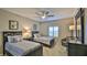 Guest bedroom with twin beds, ceiling fan, and ample closet space at 5300 S Atlantic Ave # 16-602, New Smyrna Beach, FL 32169