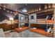 ' bedroom with treehouse bunk beds and mountain mural at 9106 Sommerset Hills Dr, Davenport, FL 33896