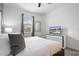 Comfortable bedroom with a king-size bed and modern decor at 9106 Sommerset Hills Dr, Davenport, FL 33896