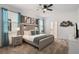 Spacious bedroom with a king-size bed and ensuite bathroom at 9106 Sommerset Hills Dr, Davenport, FL 33896