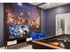 Game room with pool table, large TV, and Harry Potter mural at 9106 Sommerset Hills Dr, Davenport, FL 33896