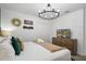 King-size bed, dresser, and TV in a well-lit bedroom at 9106 Sommerset Hills Dr, Davenport, FL 33896
