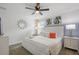 Bedroom with king-size bed, abstract art, and a modern dresser at 9106 Sommerset Hills Dr, Davenport, FL 33896