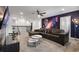 Spacious game room with a galaxy mural, comfortable seating, and large TV at 9106 Sommerset Hills Dr, Davenport, FL 33896