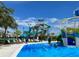 Resort-style pool with water slides and lounge chairs at 9106 Sommerset Hills Dr, Davenport, FL 33896