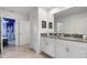 Double vanity bathroom with modern finishes and access to a Star Wars-themed room at 9106 Sommerset Hills Dr, Davenport, FL 33896