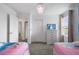 Frozen themed bedroom with twin beds and Frozen decor at 9106 Sommerset Hills Dr, Davenport, FL 33896