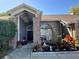 Front entryway with brick columns and landscaping at 1046 Shinnecock Hills Dr, Oviedo, FL 32765
