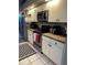 Bright kitchen with stainless steel appliances and ample counter space at 1046 Shinnecock Hills Dr, Oviedo, FL 32765