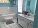 Relaxing bathroom with a large garden tub and vanity at 1046 Shinnecock Hills Dr, Oviedo, FL 32765