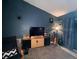 Living room with TV stand and ample space for relaxation at 1046 Shinnecock Hills Dr, Oviedo, FL 32765