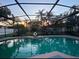 Relaxing screened pool area with sunset view at 1046 Shinnecock Hills Dr, Oviedo, FL 32765