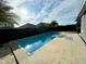 Inviting rectangular pool with surrounding concrete patio at 8019 Bushmaster Ave, Orlando, FL 32832