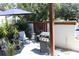 Relaxing patio with seating, grill, and umbrella at 2681 Washington Ave # 18, Eustis, FL 32726