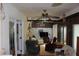 Bright Florida room with seating and TV at 2681 Washington Ave # 18, Eustis, FL 32726
