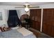 Spacious bedroom with ample closet space and a ceiling fan at 2681 Washington Ave # 18, Eustis, FL 32726