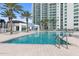 Inviting resort-style pool with surrounding patio at 231 Riverside Drive # 101-1, Holly Hill, FL 32117