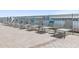 Poolside lounge chairs overlooking the water at 231 Riverside Drive # 101-1, Holly Hill, FL 32117