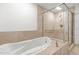 Bathroom with soaking tub and shower at 231 Riverside Drive # 101-1, Holly Hill, FL 32117