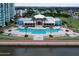 Resort-style pool with plenty of lounge chairs at 231 Riverside Drive # 101-1, Holly Hill, FL 32117