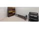 Large walk-in closet with shelving and bench at 231 Riverside Drive # 101-1, Holly Hill, FL 32117