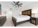 Main bedroom with king-size bed and dresser at 231 Riverside Drive # 101-1, Holly Hill, FL 32117