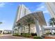 Modern high rise building with covered entrance at 231 Riverside Drive # 101-1, Holly Hill, FL 32117