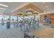 Modern fitness center with various equipment and waterfront views at 231 Riverside Drive # 101-1, Holly Hill, FL 32117