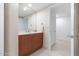 Modern bathroom with a double vanity and updated fixtures at 231 Riverside Drive # 101-1, Holly Hill, FL 32117