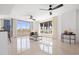Spacious living room featuring tiled floors and large windows at 231 Riverside Drive # 101-1, Holly Hill, FL 32117