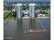 Aerial view of waterfront high-rises and marina at 231 Riverside Drive # 101-1, Holly Hill, FL 32117