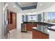 Modern kitchen with stainless steel appliances and granite countertops at 231 Riverside Drive # 101-1, Holly Hill, FL 32117