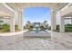 Elegant building entrance with fountain and landscaping at 231 Riverside Drive # 101-1, Holly Hill, FL 32117