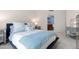 Bedroom with a double bed and calming decor, next to a bathroom at 231 Riverside Drive # 101-1, Holly Hill, FL 32117