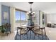 Elegant dining room with hardwood floors and modern furniture at 231 Riverside Drive # 101-1, Holly Hill, FL 32117